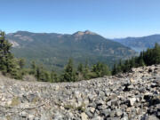 This easterly view from the top of Wind Mountain shows a rock field stretching below, and Dog Mountain next door.