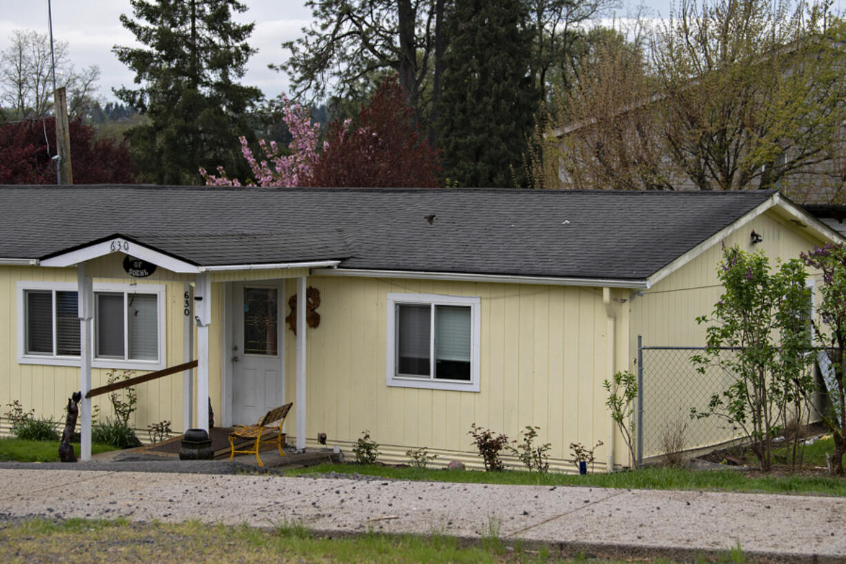 A home in La Center, which previously featured swastikas and a Nazi flag, is pictured without either Tuesday morning.