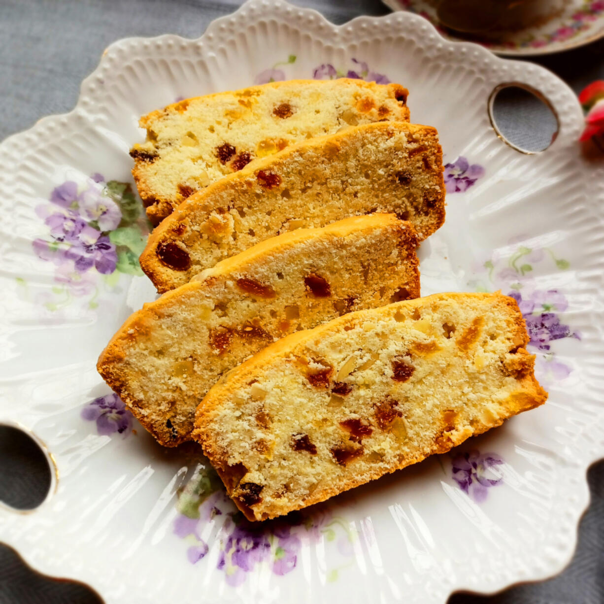 This golden fruitcake contains apricots, oranges, almonds and golden raisins.