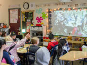 Fourth-grade students enrolled in the Dual Language Program at Columbia Elementary School break down cultural barriers through language and social connection by collaborating with Spanish-speaking students in Puerto Rico using Zoom teleconferencing software.