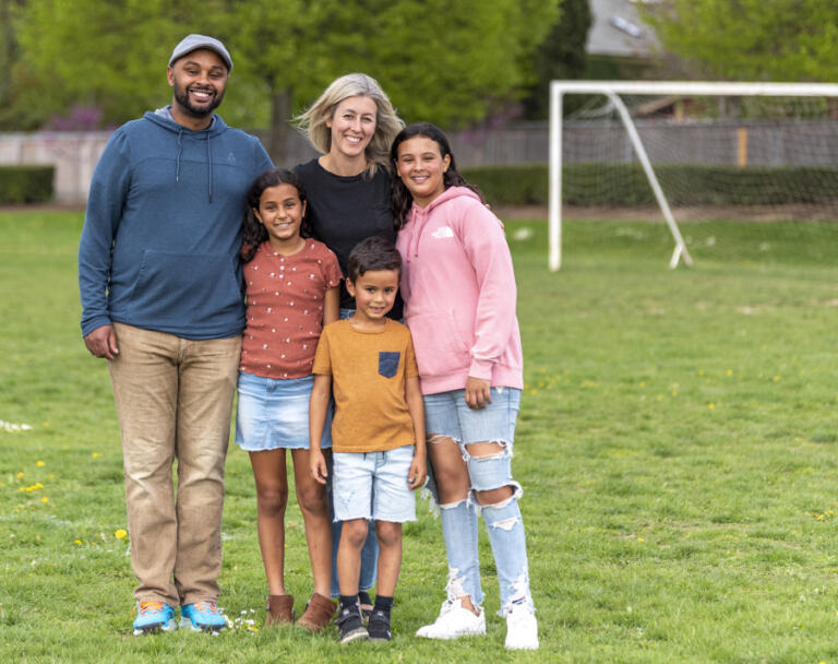 The Afenegus family -- Filly, from left, Ella, 9, Tiffany, Noah, 5, and Maia, 11, -- stand for a portrait Wednesday, May 3, 2023, at Felida Elementary School.