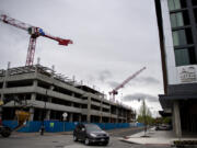 Construction continues at the future location for ZoomInfo, left, at the Port of Vancouver's Terminal 1. ZoomInfo plans to relocate when the project is completed in 2025.