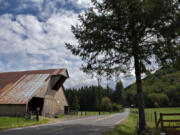 Work on Tum Tum Springs Dairy farm's historic barn on Northeast Healy Road in Amboy was recently recognized for its contribution to preserving the state's historic barns.