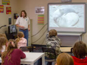 Marine biologist John Ford brought bones for students to handle as part of his April 26 presentation at Lewis River Academy.