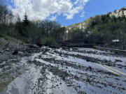 Both directions of the Spirit Lake Memorial Highway remain closed & will likely be for a while after the massive slide Sunday. The road and bridge up to Mount St. Helens Johnston Ridge Observatory were washed out by a large amount of debris, causing catastrophic damage.