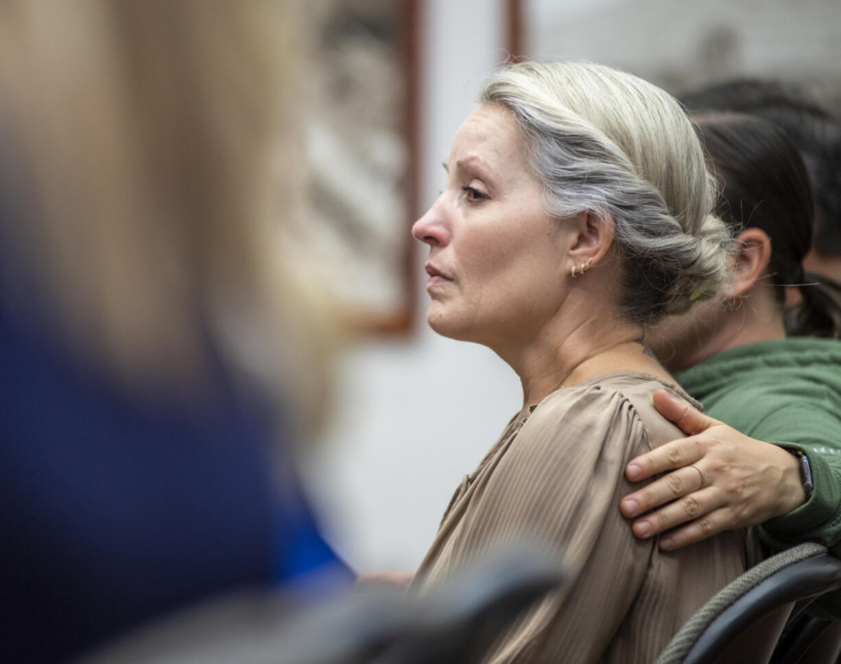 Jill Brown, wife of slain Clark County sheriff's Sgt. Jeremy Brown, cries Thursday during the Clark County Law Enforcement Memorial ceremony at the Clark County Public Service Center in downtown Vancouver. Jeremy Brown was killed July 23, 2021, while conducting surveillance at an east Vancouver apartment complex.