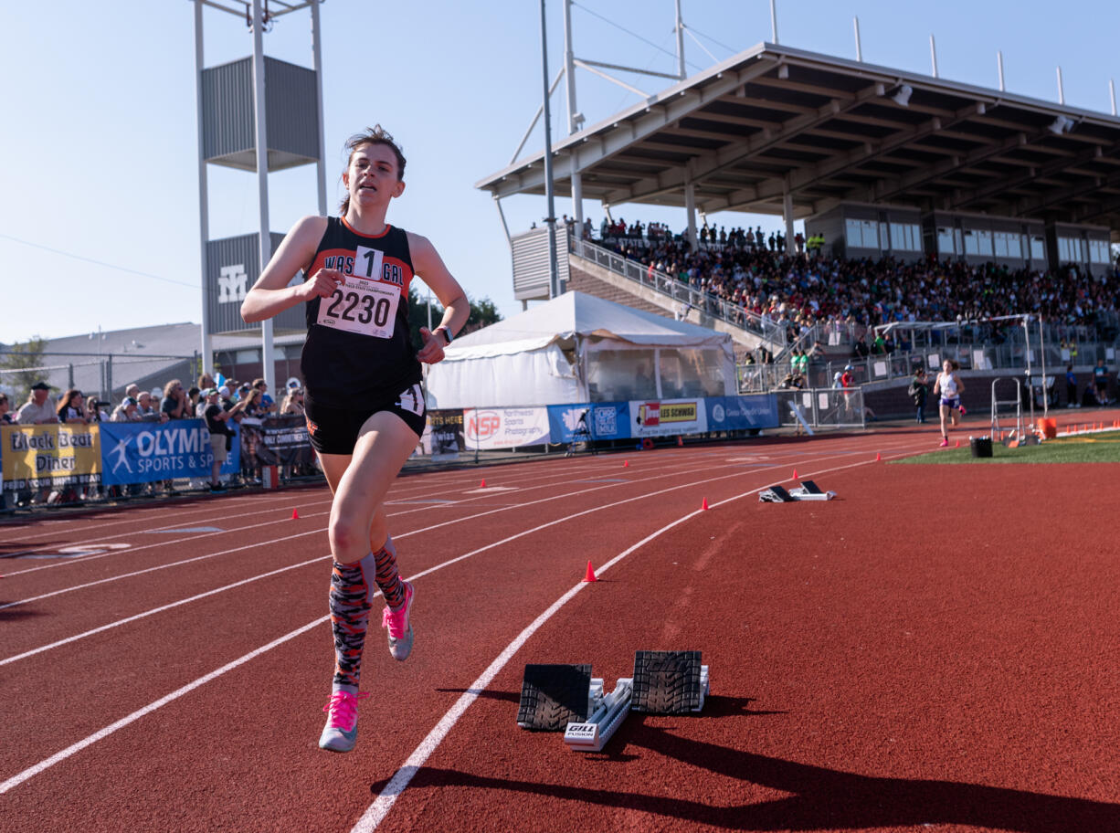 Washougal’s Sydnee Boothby rounds a turn as she starts the third lap of the 1600-meter finals at the WIAA 2A/3A/4A State Track and Field Championships on Thursday, May 25, 2023, at Mount Tahoma High School in Tacoma.