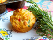 With sharp cheddar cheese, grated Parmesan, pimientos, scallions and two tablespoons of fresh rosemary, these muffins are practically a meal in themselves.