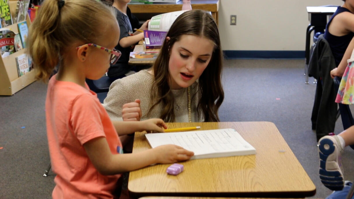 Washougal High School students in the child development and education course are gaining hands-on job experience by assisting in classrooms at Gause Elementary School.