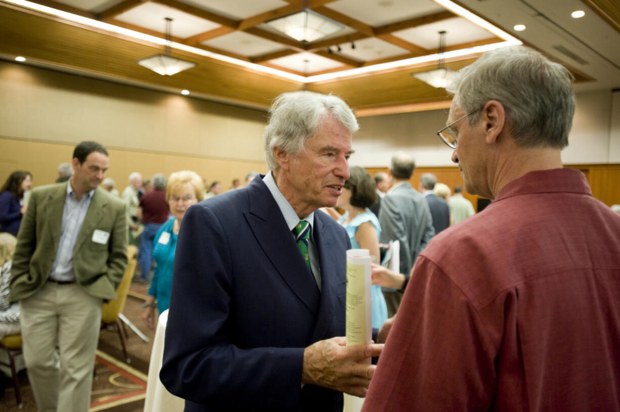 Former Congressman Don Bonker, center, and Oregon Congressman Earl Blumenauer speak after a recognition reception for the 25th anniversary of the passage of the Columbia River Gorge National Scenic Act on Aug. 13, 2011, at Skamania Lodge.