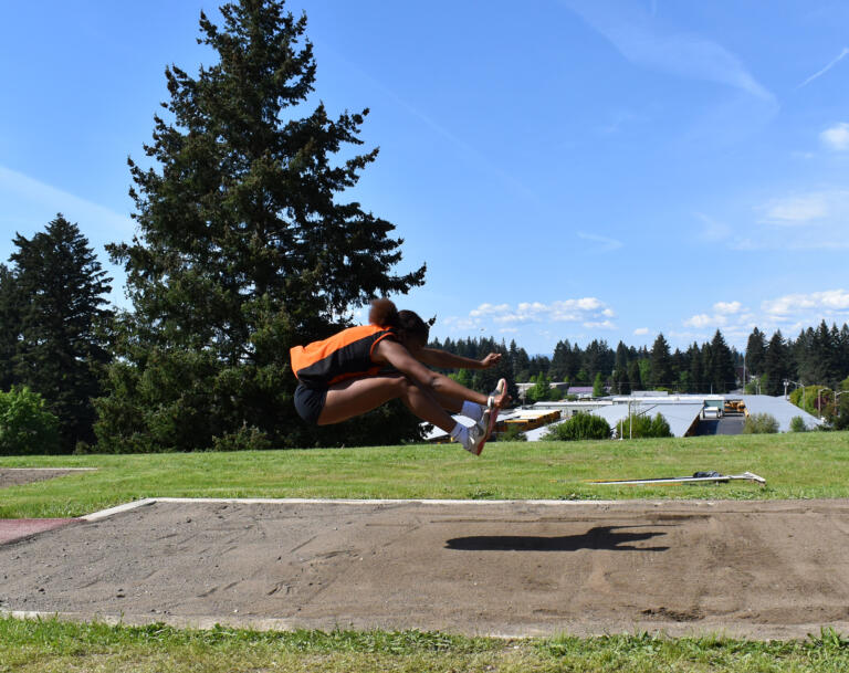 Faizah Ford of Battle Ground competes in the 4A girls long jump at the 4A/3A district track and field meet at McKenzie Stadium on Thursday, May 11, 2023.