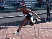 Skyview's Emem Ntekpere clears the final hurdle on her way to winning the 4A girls 300-meter hurdles at the 4A/3A district track and field meet at McKenzie Stadium on Thursday, May 11, 2023.