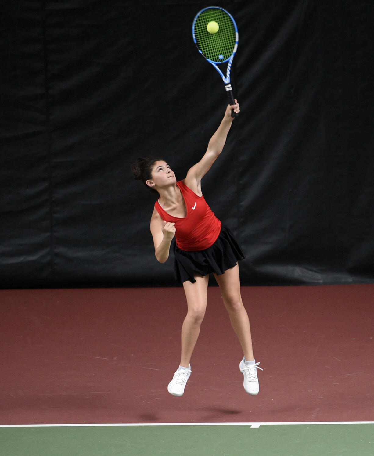 Hailey Kerker serves the ball during the singles championship match at the 4A District 4 girls tennis tournament at Club Green Meadows on Saturday, May, 13, 2023.