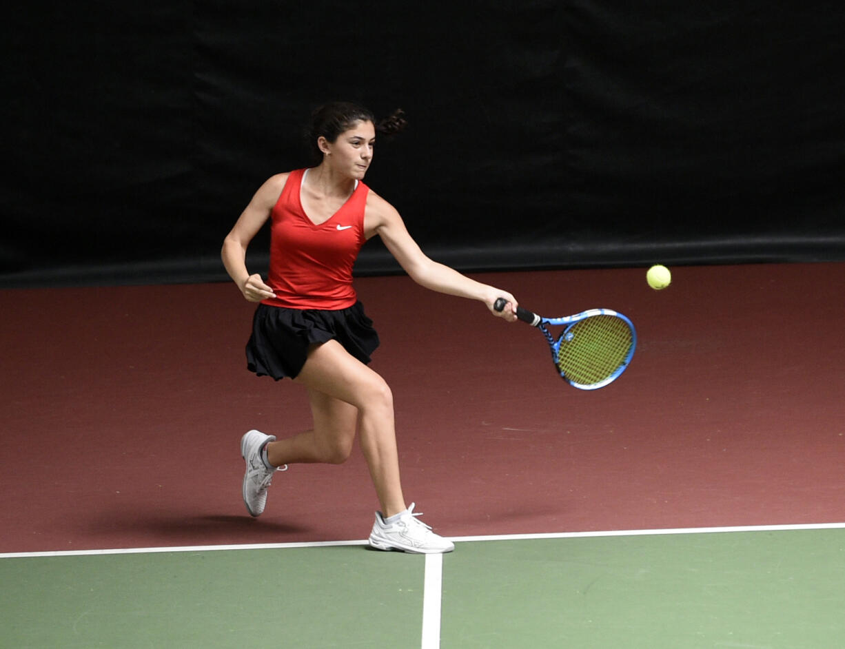 Hailey Kerker of Camas returns a shot during the singles championship match at the 4A District 4 girls tennis tournament at Club Green Meadows on Saturday, May, 13, 2023.