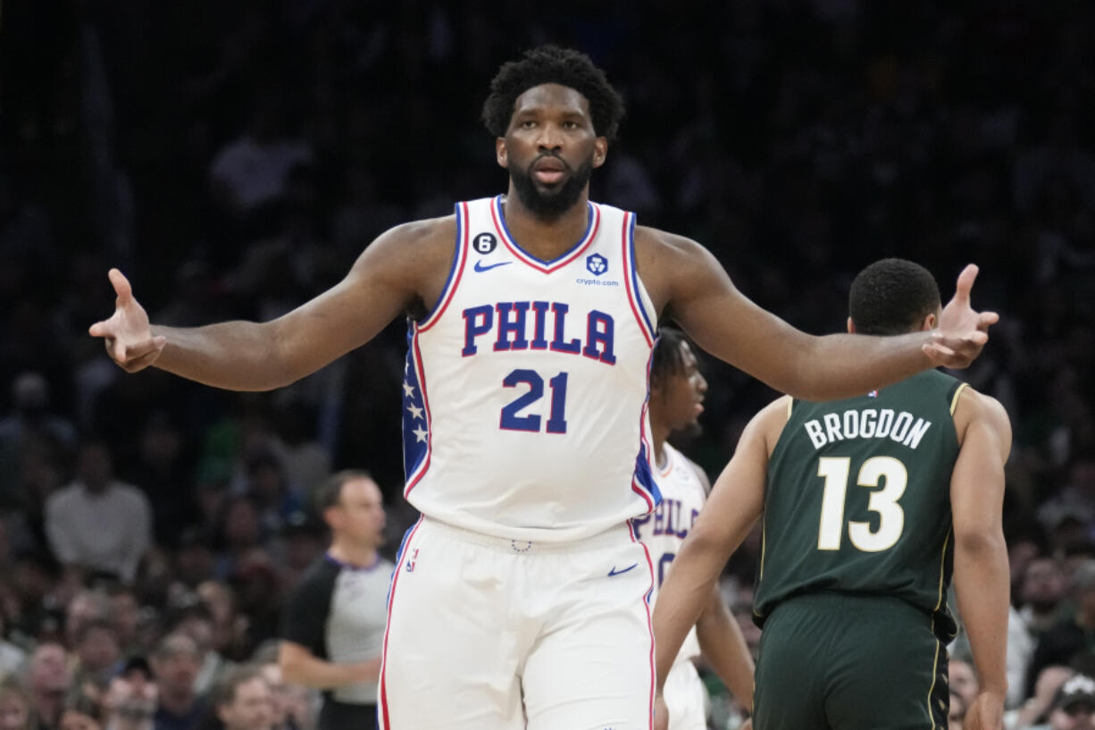 Philadelphia 76ers center Joel Embiid celebrates after hitting a 3-pointer against the Boston Celtics during the second half of Game 5 in the NBA basketball Eastern Conference semifinals playoff series, Tuesday, May 9, 2023, in Boston. The 76ers defeated the Celtics 115-103.