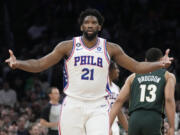 Philadelphia 76ers center Joel Embiid celebrates after hitting a 3-pointer against the Boston Celtics during the second half of Game 5 in the NBA basketball Eastern Conference semifinals playoff series, Tuesday, May 9, 2023, in Boston. The 76ers defeated the Celtics 115-103.