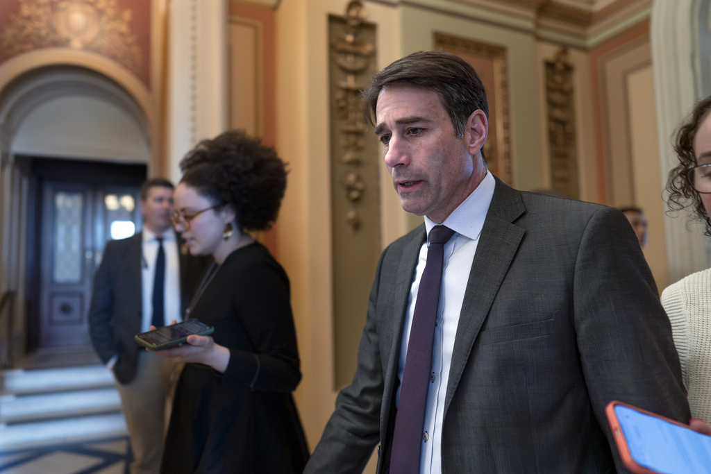 FILE - Rep. Garret Graves, R-La., a key legislator working on the debt ceiling bill for House Speaker Kevin McCarthy, walks past the chamber at the Capitol in Washington, Wednesday, April 26, 2023. A top debt ceiling negotiator for McCarthy said Friday, May 19, that it's time to “press pause” on talks as negotiations with the White House came to an abrupt standstill at the Capitol. Graves, who was tapped by McCarthy to lead talks, emerged from the hour-long session saying there remain gaps between the House Republicans and the Democratic administration. (AP Photo/J.