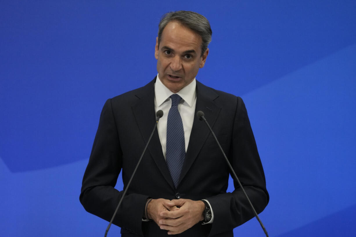 Greece's Prime Minister and leader of New Democracy Kyriakos Mitsotakis gives a speech at the headquarters of his party in Athens, Greece, Sunday, May 21, 2023. Prime Minister Kyriakos Mitsotakis and his conservative party are leading Greece's election by a wide margin, according to partial official results, but a new electoral law means he will be unable to form a government without seeking coalition partners, and a second election is likely.