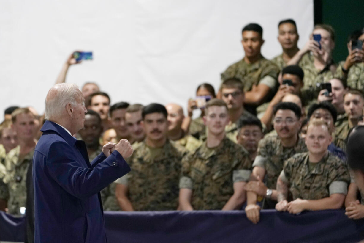 President Joe Biden greets troops upon his arrival at Marine Corps Air Station Iwakuni in Iwakuni, Japan, Thursday, May 18, 2023. Biden made the stop on his way to attend the G-7 Summit in Hiroshima, Japan.