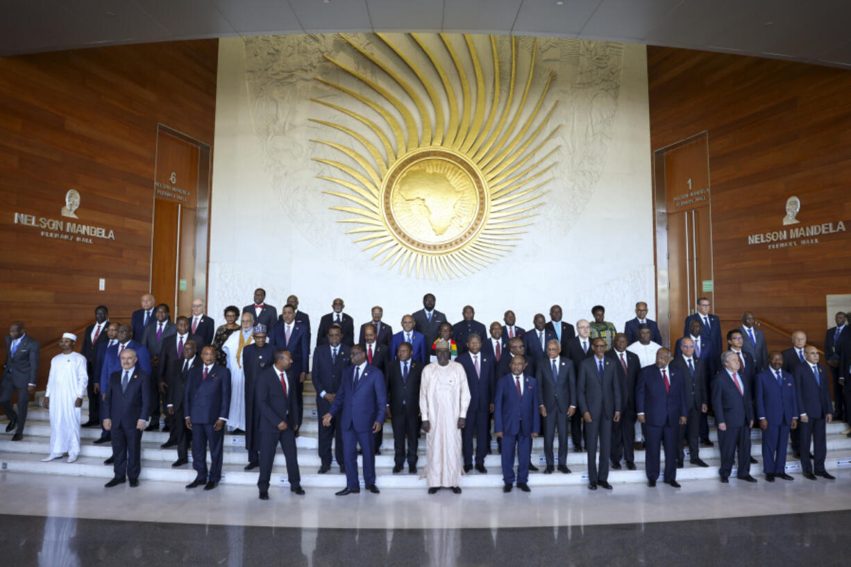 FILE - Leaders gather for a group photo at the African Union Summit in Addis Ababa, Ethiopia, on Feb. 18, 2023. Calls for unity dominated the 60th anniversary celebrations on Thursday, May 25, 2023 for the continent-wide organization preceding the African Union (AU) but critics say the AU has become a paper tiger where there's plenty of talk, but not much much real clout to enforce its mandate.