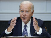 FILE - President Joe Biden speaks during a meeting with his "Investing in America Cabinet," in the Roosevelt Room of the White House, Friday, May 5, 2023, in Washington. Biden would veto a House GOP bill that aims to restrict asylum, build more border wall and cut a program that allows migrants a chance to stay in the U.S. lawfully for two years, an administration official said Monday, May 8.