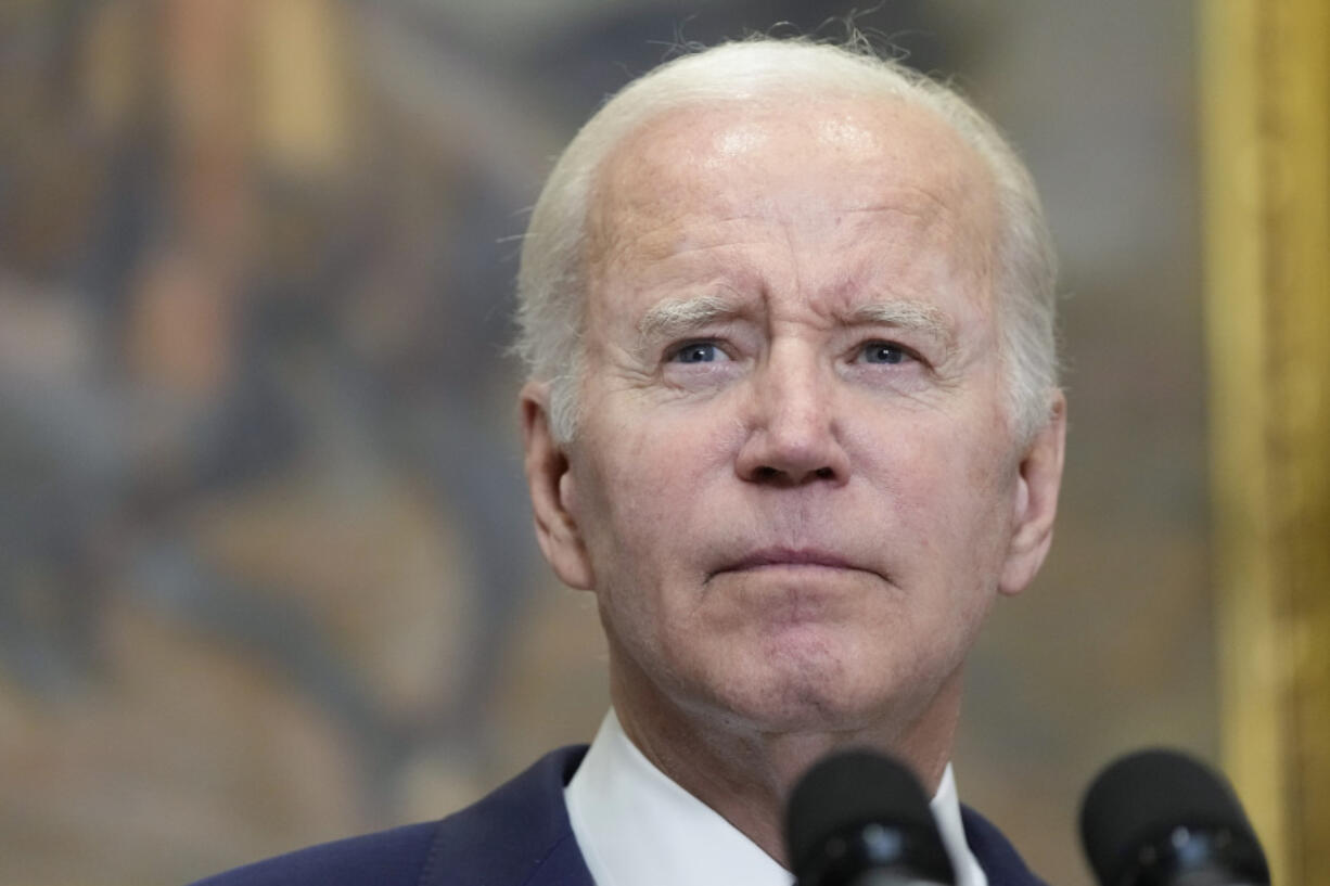 President Joe Biden listens to a reporter's question as he speaks in the Roosevelt Room of the White House, Sunday, May 28, 2023, in Washington. Biden and House Speaker Kevin McCarthy reached a final agreement Sunday on a deal to raise the nation's debt ceiling while trying to ensure enough Republican and Democratic votes to pass the measure in the coming week.