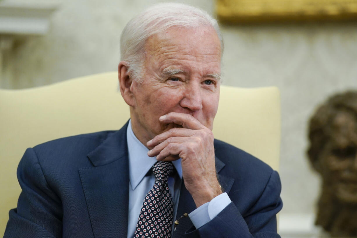 FILE - President Joe Biden listens as he meets with House Speaker Kevin McCarthy of Calif., to discuss the debt limit in the Oval Office of the White House, May 22, 2023, in Washington. A federal prosecutor tapped by President Joe Biden to become a U.S. district judge in Kansas has withdrawn from consideration, citing the nearly two-year wait for action on his nomination. Jabari Wamble is Biden's second judicial nominee to withdraw this month.