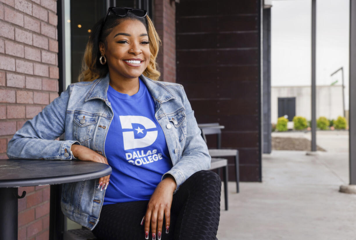 Dallas College student Kianna Vaughn sits for a portrait in the Red Bird area of Dallas on Thursday, April 20, 2023. After enrolling in the school the previous year, Vaughn met with a Dallas College success coach who helped her lay out a flexible roadmap that allowed her to juggle school and a full-time job.