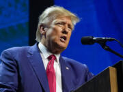 FILE - Former President Donald Trump speaks at the National Rifle Association Convention in Indianapolis, on April 14, 2023.(AP Photo/Michael Conroy, File)