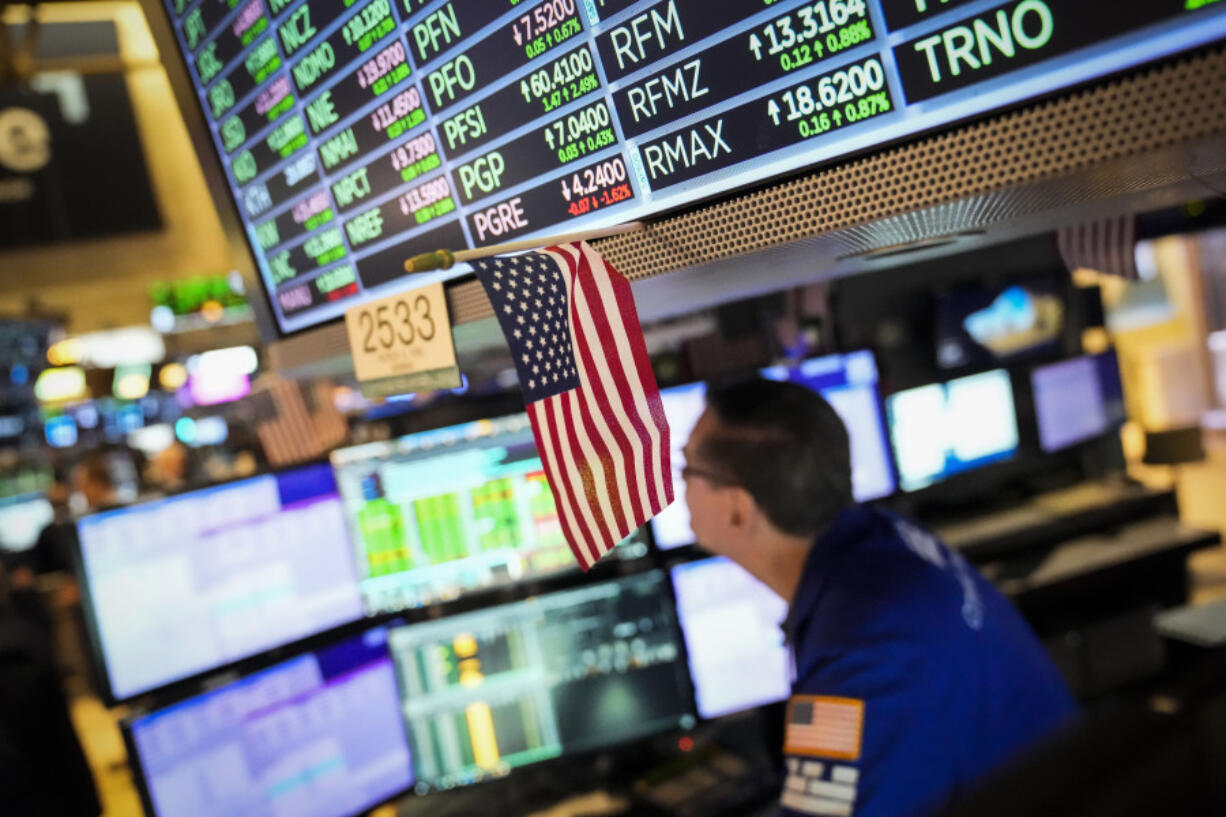 A trader works the floor at the New York Stock Exchange, Friday, May 26, 2023, in New York.