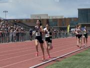 Seton Catholic’s Alexis Leone runs in first place  trailed by Port Townsend’s Aliyah Yearian of the Class 1A girls 3,200 meters at the 1A/2B/1B state track and field championships on Saturday, May 27, 2023, in Yakima.