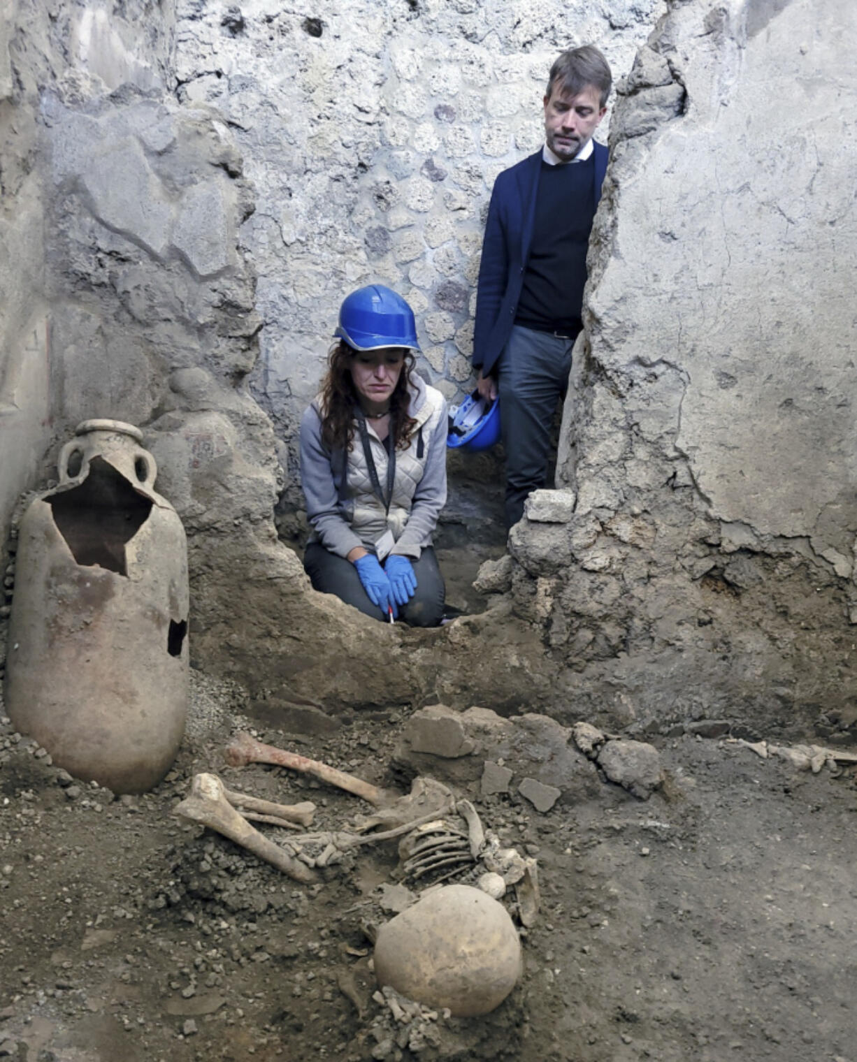 One of two skeletons that archaeologists believe were men who died when a wall collapsed on them during the powerful earthquakes that accompanied the eruption of Mount Vesuvius in 79 A.D.