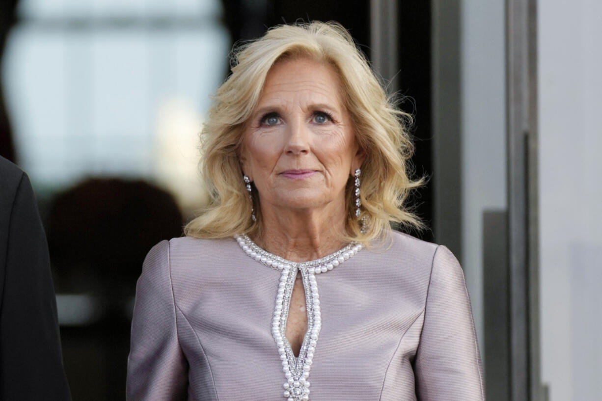 FILE - First lady Jill Biden waits with President Joe Biden to greet South Korea's first lady Kim Keon Hee and South Korea's President Yoon Suk Yeol on the North Portico of the White House in Washington ahead of a State Dinner, April 26, 2023. Jill Biden will promote women and youth empowerment, and attend a Jordanian royal wedding, during an upcoming trip to the Middle East, North Africa and Europe. The first lady's office says she'll depart on a six-day trip that will take her to Jordan, Egypt, Morocco and Portugal.