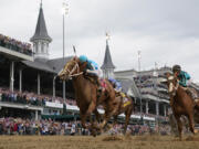 Mage (8), with Javier Castellano aboard, wins the 149th running of the Kentucky Derby horse race at Churchill Downs Saturday, May 6, 2023, in Louisville, Ky.