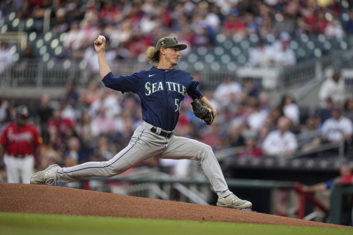 Seattle Mariners starting pitcher Bryce Miller delivers in the first inning of a baseball game against the Atlanta Braves, Friday, May 19, 2023, in Atlanta.