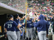 Seattle Mariners' Julio Rodriguez (44) celebrates his two-run home run against the Detroit Tigers in the ninth inning of a baseball game, Friday, May 12, 2023, in Detroit.