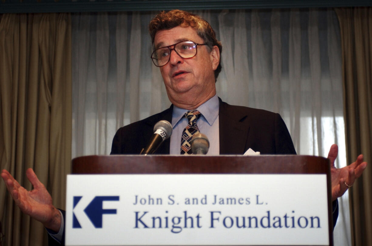 FILE - Hodding Carter III, president, CEO and Trustee of the John S. and James L Knight Foundation, answers a question during a news conference in Washington, Monday, Nov. 24, 2003.  Carter III, a Mississippi journalist and civil rights activist who updated Americans on the Iran hostage crisis as U.S. State Department spokesman and won awards for his televised documentaries, has died. His daughter, Catherine Carter Sullivan, confirmed that he died Thursday, May 11, 2023 in Chapel Hill, North Carolina.