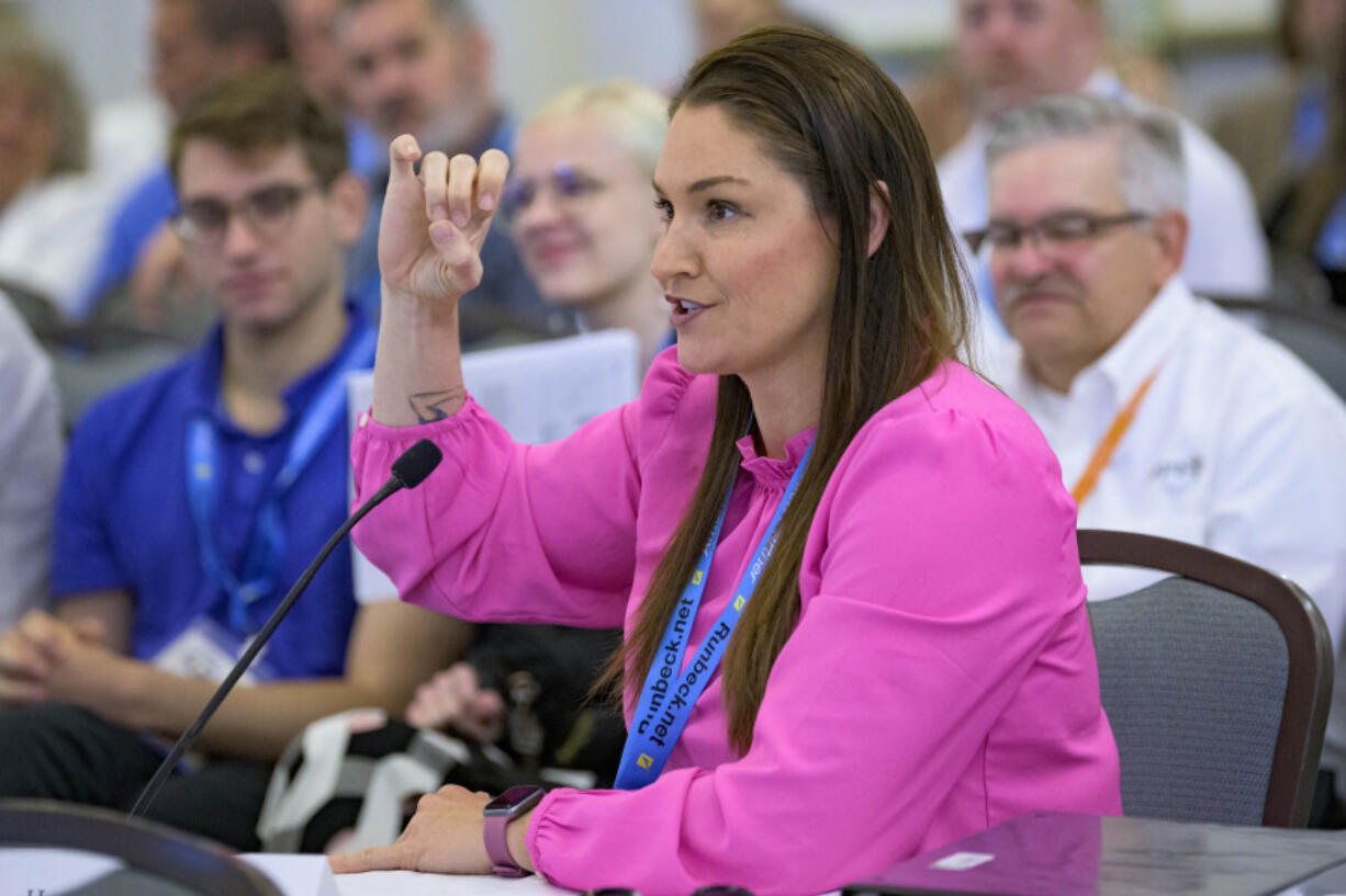 FILE - Oregon Secretary of State Shemia Fagan attends the summer conference of the National Association of Secretaries of State in Baton Rouge, La., July 8, 2022.