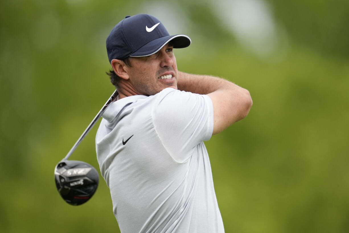 Brooks Koepka watches his tee shot on the ninth hole during the third round of the PGA Championship golf tournament at Oak Hill Country Club on Saturday, May 20, 2023, in Pittsford, N.Y.