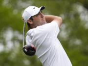 Scottie Scheffler watches his tee shot on the sixth hole during the second round of the PGA Championship golf tournament at Oak Hill Country Club on Friday, May 19, 2023, in Pittsford, N.Y.