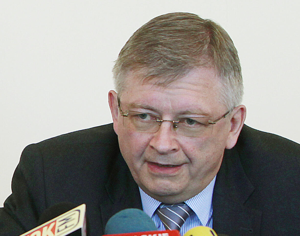 FILE - This file photo from May 12, 2015, shows Russian ambassador to Poland Sergey Andreev during a news conference in Warsaw, Poland. The Polish Foreign Ministry summoned the Russian ambassador in protest Friday after a former Russian official suggested that it would be acceptable to assassinate Poland's ambassador to Russia.