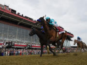 National Treasure, with jockey John Velazquez, edges out Blazing Sevens, with jockey Irad Ortiz Jr., to win the148th running of the Preakness Stakes horse race at Pimlico Race Course, Saturday, May 20, 2023, in Baltimore.