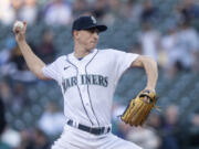 Seattle Mariners starter George Kirby delivers a pitch during the first inning of a baseball game against the Texas Rangers, Tuesday, May 9, 2023, in Seattle.