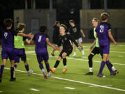 Columbia River goalkeeper Cameron Harris (1) joins his teammates in celebration after the Rapids' 2-1 win over Sehome in the Class 2A boys soccer state semifinal at Renton Memorial Stadium on Friday, May 26, 2023.