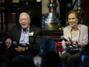 FILE - Former President Jimmy Carter and his wife former first lady Rosalynn Carter sit together during a reception to celebrate their 75th wedding anniversary on July 10, 2021, in Plains, Ga. The Carter family shared news that Rosalynn Carter has dementia, The Carter Center announced Tuesday, May 30, 2023.