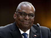 Secretary of Defense Lloyd Austin smiles as he appears before a Senate Appropriations hearing on the President's proposed budget request for fiscal year 2024, on Capitol Hill in Washington, Tuesday, May 16, 2023.