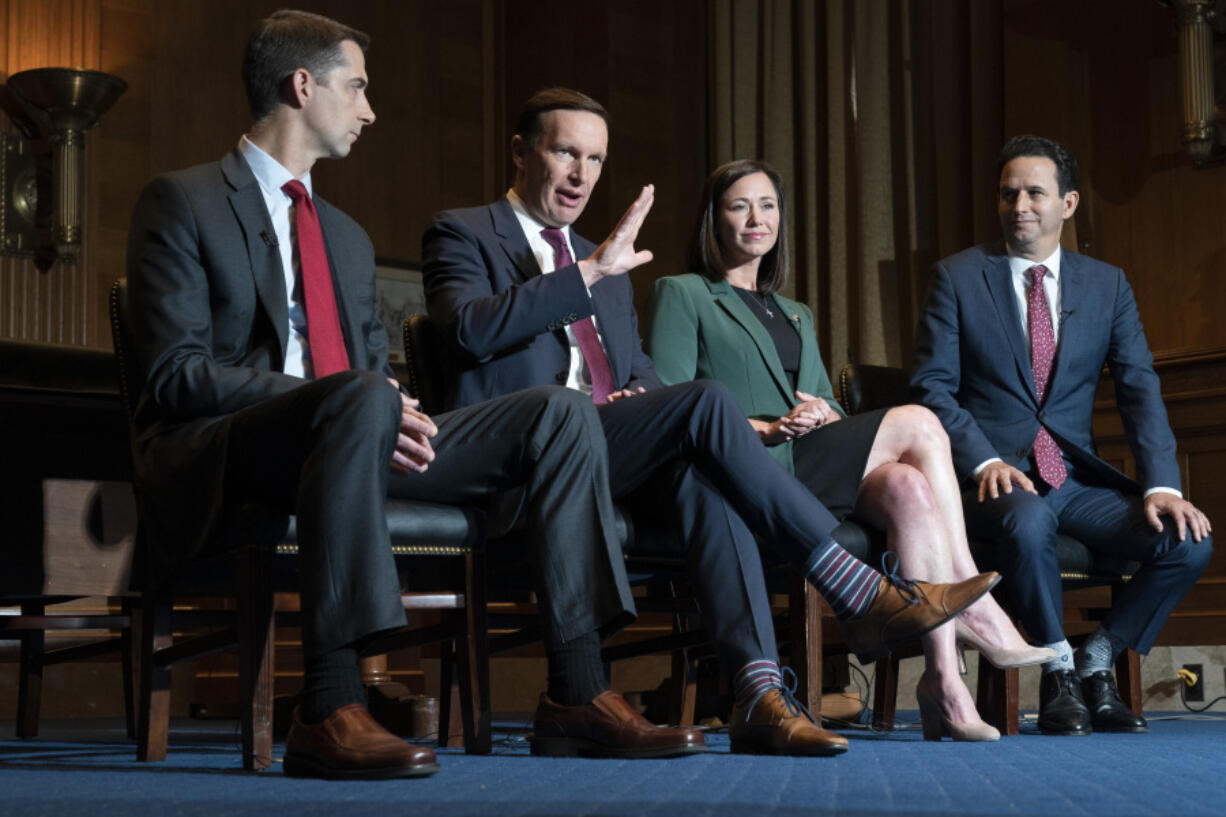 From left, Sen. Tom Cotton, R-Ark., Sen. Christopher Murphy, D-Conn., Sen. Katie Britt, R-Ala., and Sen. Brian Schatz, D-Hawaii, who have introduced legislation to protect kids on social media, are interviewed by the Associated Press, Wednesday, May 3, 2023, on Capitol Hill in Washington.