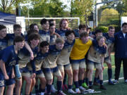 The Seton Catholic boys soccer team poses for a team photo after beating King's Way Christian 2-1 in a 1A district playoff game on Tuesday, May 9, 2023.