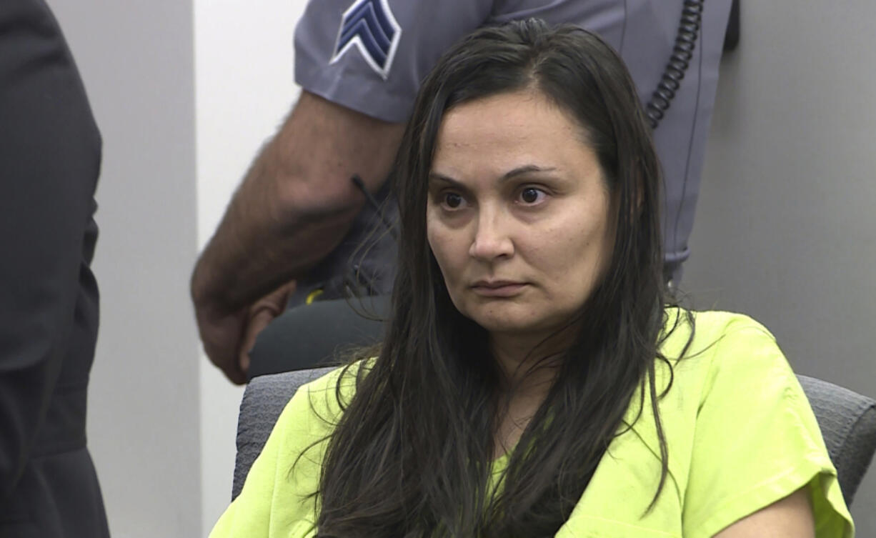 FILE - Letecia Stauch appears in El Paso County District Court in Colorado Springs, Colo., March 11, 2020. Closing arguments are expected Friday, May 5, 2023, in the trial of Stauch, a woman accused of killing her 11-year-old stepson in Colorado, putting his body in a suitcase and then dumping it over a bridge in Florida. Authorities allege Stauch killed Gannon Stauch by stabbing and shooting him a few hours before reporting him missing on Jan. 27, 2020, while his father was on a National Guard deployment.