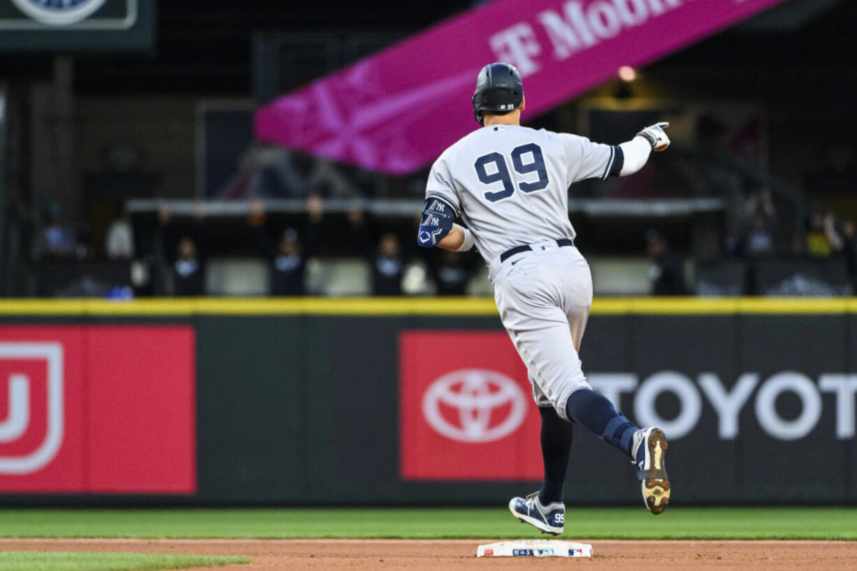 New York Yankees' Aaron Judge runs the bases after hitting a solo home run against the Seattle Mariners during the seventh inning of a baseball game Tuesday, May 30, 2023, in Seattle.